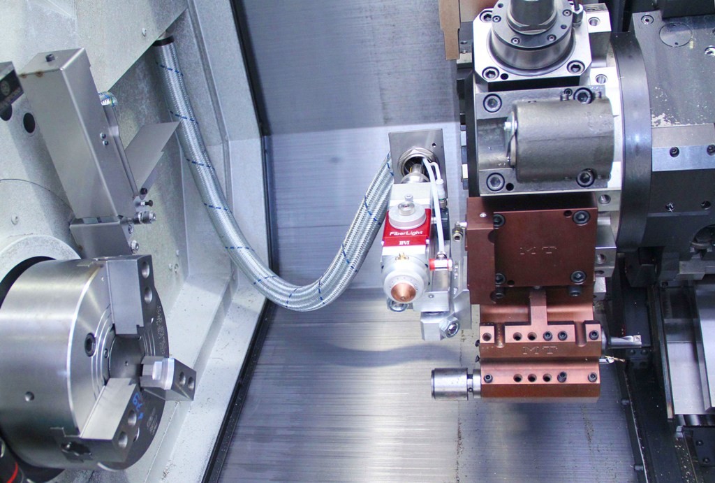 FIRST LASER CUTTING DEVICE FOR TURRET LATHE - MT Marchetti